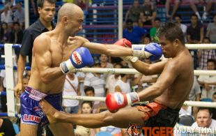 Tiger Muay Thai trainer Dernkabuan fights at Bangla boxing stadium in Phuket, Thailand, Wednesday, Aug. 14, 2013. (Photo by Mitch Viquez Â©2013)