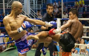 Tiger Muay Thai trainer Dernkabuan fights at Bangla boxing stadium in Phuket, Thailand, Wednesday, Aug. 14, 2013. (Photo by Mitch Viquez Â©2013)
