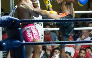 Tiger Muay Thai fighter Petdam fights at Patong Sainamyen Road stadium in Phuket, Thailand, Thursday, Aug. 8, 2013. (Photo by Mitch Viquez Â©2013)