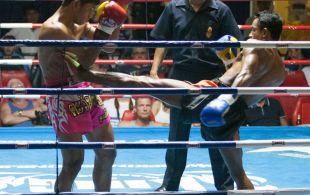 Tiger Muay Thai fighter Petdam fights at Patong Sainamyen Road stadium in Phuket, Thailand, Thursday, Aug. 8, 2013. (Photo by Mitch Viquez Â©2013)