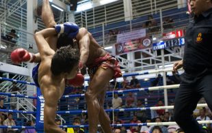 Tiger Muay Thai fighter Petdam fights at Bangla stadium in Phuket, Thailand, Friday, Jun. 21, 2013. (Photo by Mitch Viquez Â©2013)